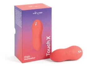 We-Vibe Touch X Rechargeable Silicone Lay-On Vibrator and Massager - Crave Coral