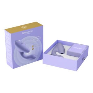 Lavender clitoral suction toy shown in its open purple gift box